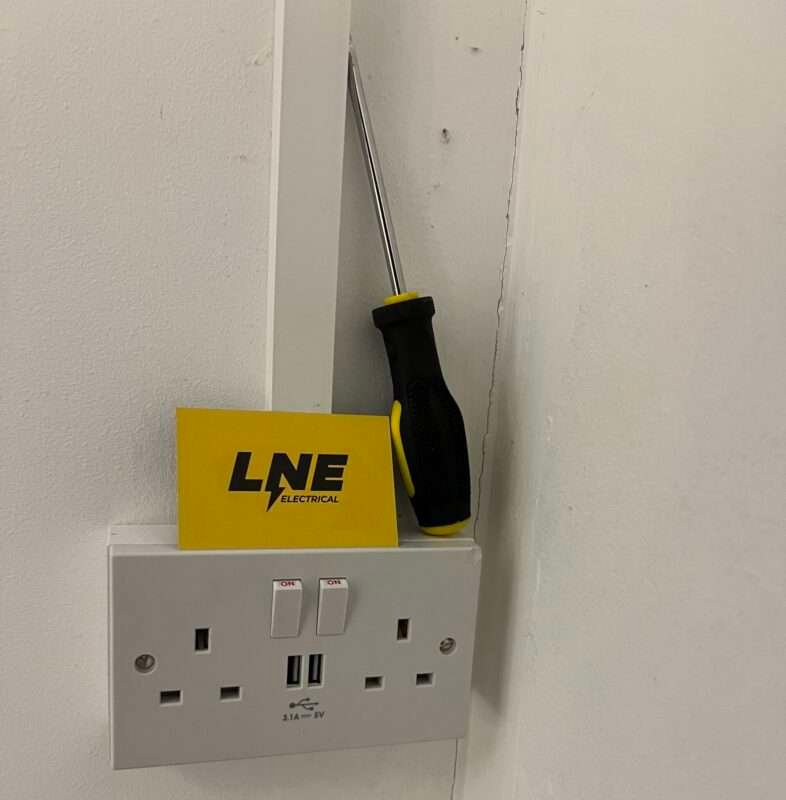 double plug socket fitted to an office unit