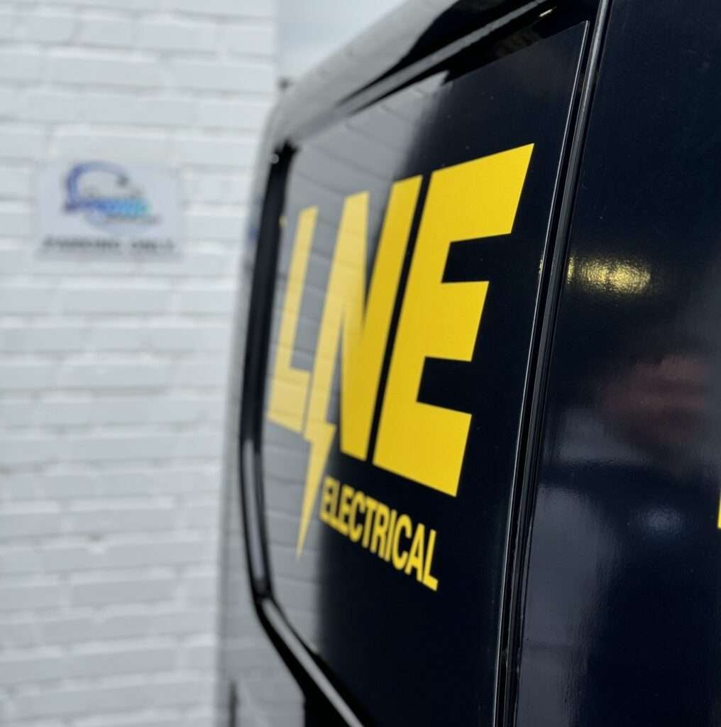 sign written electrical van with nice branding